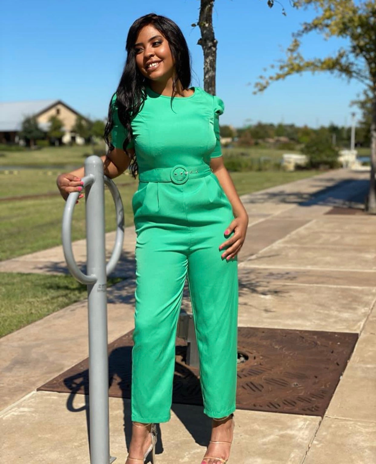 LIBERTY Green jumpsuit featuring short puff sleeves